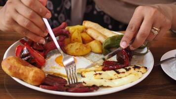 Enjoying a hearty breakfast at a local cafe video