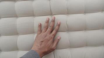 Exploring texture on soft bedding with a hand gesture video