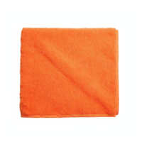 Orange Folded Bath Towel Soft Plush Fabric Texture Isolated on Transparent Background Clipping Path png