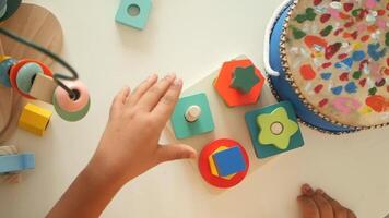 Engaging kids with colorful shape sorting toys at home video
