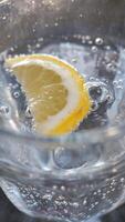 Lemon slice adds freshness to sparkling drink video