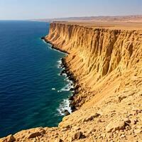 The sea and the cliffs of the desert in the middle of the desert photo