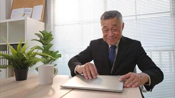 In a modern office, the boss has good news about an important project that was presented to the client and approved. video