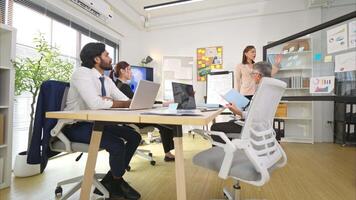 In a contemporary office, a group of senior executives with a mission to approve new projects and monitor the progress of business projects,12 video