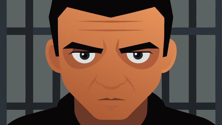 A closeup of the prisoners face showing a furrowed brow and intense eyes as they contemplate their choices with the cell blurred in the background..