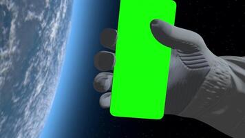 3d rendering. Astronaut in outer space holds a smartphone with green screen, ideal for advertising, branding, or promotional content in sci-fi, tech, or futuristic campaigns. video