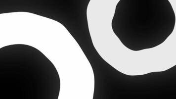 Expanding white rings on black background animation video