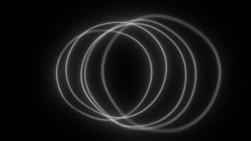 Glowing multiple concentric circles expanding and rotating on black background video