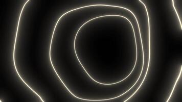 Glowing lines rotating and creating concentric circles on black background video