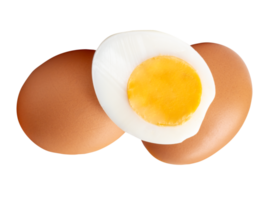 Chicken eggs and cooked or boiled chicken egg with egg yolk in half in small pile isolated with clipping path in file format png