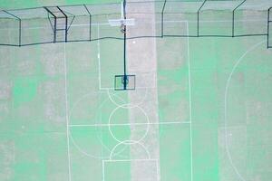 drone shot of colorful outdoor sports field from above photo