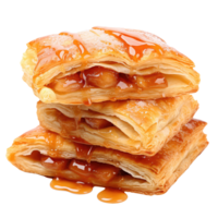 Three pieces of pastry with caramel sauce on top png