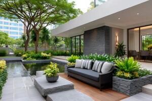 Modern house with beautiful garden featuring pond and comfortable sofa photo