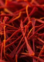 Close up view of vibrant saffron threads in detail photo