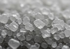 Detailed close-up of salt crystals, highlighting the texture and form. photo