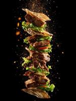 Falling Vegetables And Sizzling Kebab Meat photo
