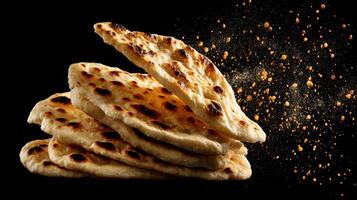 Fluffy Naan Bread Pieces In Soft Motion photo