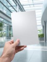 A5 Flyer and Leaflet Template Held in a Hand photo