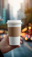 Coffee Cup Sleeve Template Held in a Hand photo