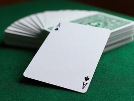 A Vintage Playing Card Template On A Felt Surface photo