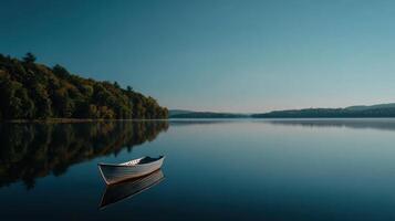 A Calm Lake With A Single And Serene Fishing Boat photo