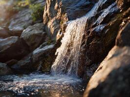 A Cascade On A Mountain At The Golden Hour photo