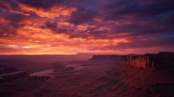 A Desert Canyon At Sunset In A Dramatic Scene photo