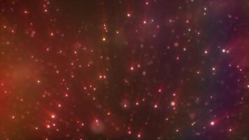 Abstract composition of sparkling red and orange light particles with dreamy bokeh effect, creating a warm cosmic atmosphere video