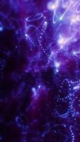 Purple abstract glowing dots forming chaotic trails over a dark backdrop video