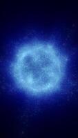 Digital cloud of tiny glowing blue particles forming a cosmic ring against a dark background video
