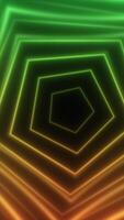 Geometric green and orange pentagon tunnel with glowing neon lines, creating a hypnotic depth effect video