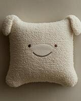 A pillow with a face on it photo