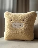 A pillow with a smiley face on it photo