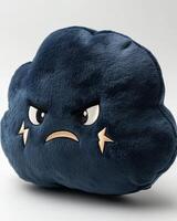 A blue cloud shaped pillow with an angry face photo