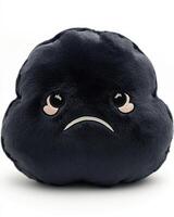 A black cloud shaped pillow with sad eyes photo