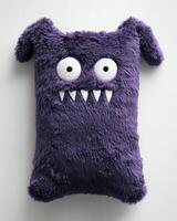 A purple monster pillow with eyes and a big nose photo