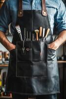Man in Leather Apron with Tools photo