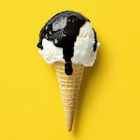 Ice cream cone with chocolate sauce photo