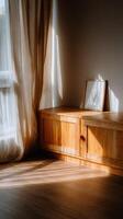 Bright window light casting shadows in Living Room on Cabinet photo