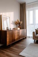 Modern apartment living room with sideboard in daylight photo