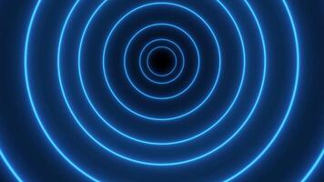 Blue neon circle background animation zooming in. Looping motion design video