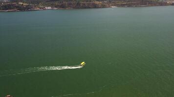 Passenger boat sailing on Tagus River in Lisbon from above video