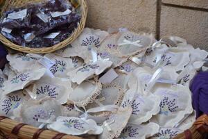 Aromatic lavender bags and crafts at Brihuega festival in Spain. Embroidered sachets with lavender photo