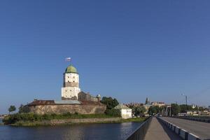 Ancient castle in Vyborg, Russia. View from bridge. photo