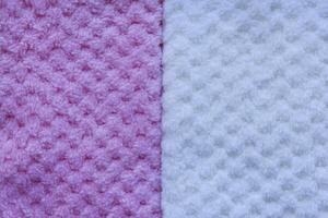 Luxury towels in gradient colors. Background of colorful towels. Several soft terry towels. photo