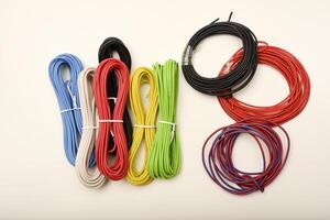 Color-coded wiring for PCB assembly. Coils of multicolored wires. Connecting wires for electronics. photo