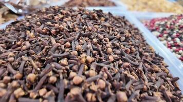 Close-Up of Dried Cloves in a Market Display Tray video