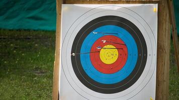 Close-Up of Archery Target Practice with Arrows in Bullseye photo
