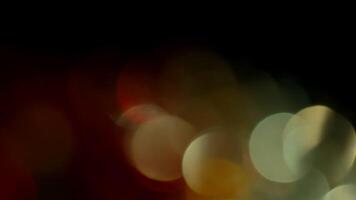 Multicolored light leaks footage on black background. Lens studio flare leak burst overlays. Natural lighting lamp rays bokeh effect. For compositing over your footage, stylizing , transitions. video