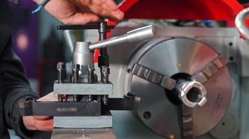 Metalworking Equipment Setup Process, Operator Adjusting Lathe Tool Holder for Precision Turning video